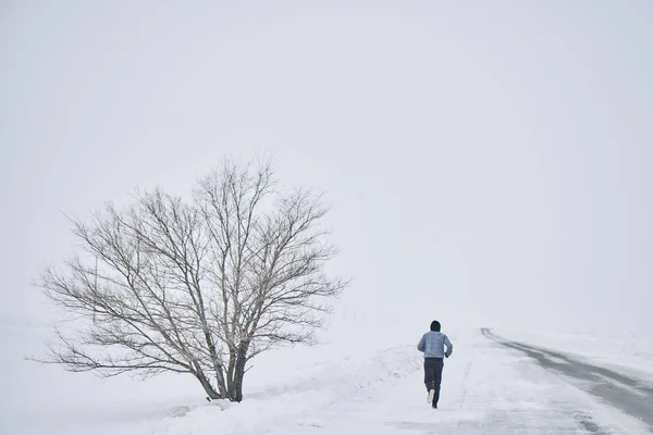 Back View Sportsman Running Highway Winter Day Stock Picture