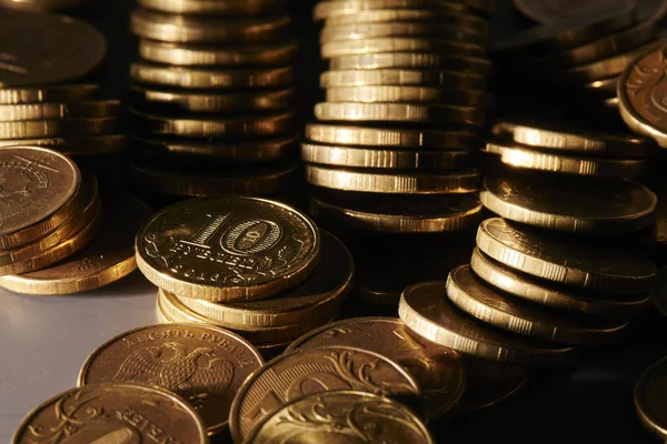 pile of russian iron coins on dark surface, close-up