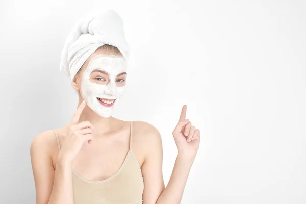 Beautiful Woman Towel Head Pointing Finger Mask Face Beauty Treatment — Stock Photo, Image