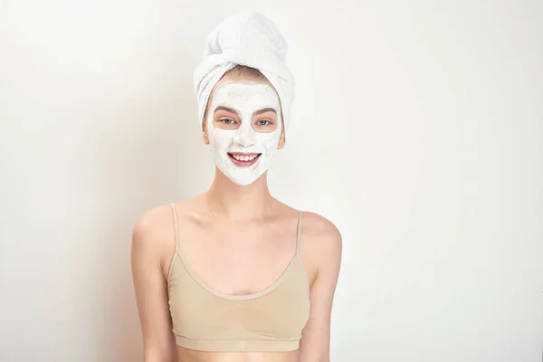 Attractive Woman Face Mask Towel Head Looking Camera Isolated White — Stock Photo, Image