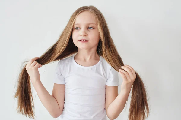 Portrait Little Girl Holding Hair Hands White Background — Stock Photo, Image