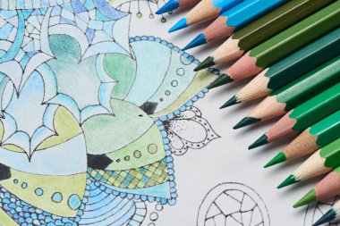 coloring page with pencils in blue and green colors, close-up  clipart