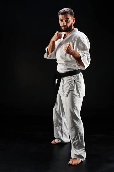 Karate Man Kimono Fighting Stance Black Background — Stok Foto