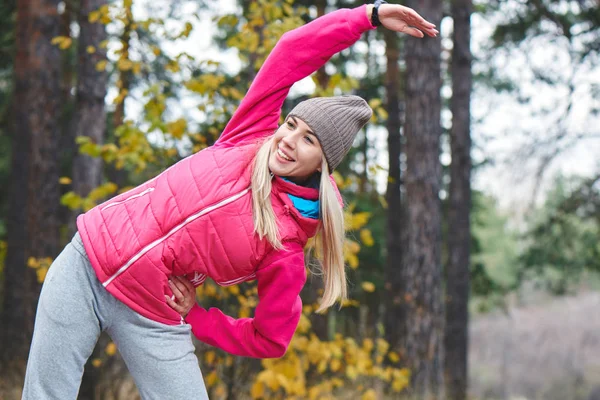 Woman Athlete Jacket Hat Performing Exercises Slopes Forest — Stock Photo, Image