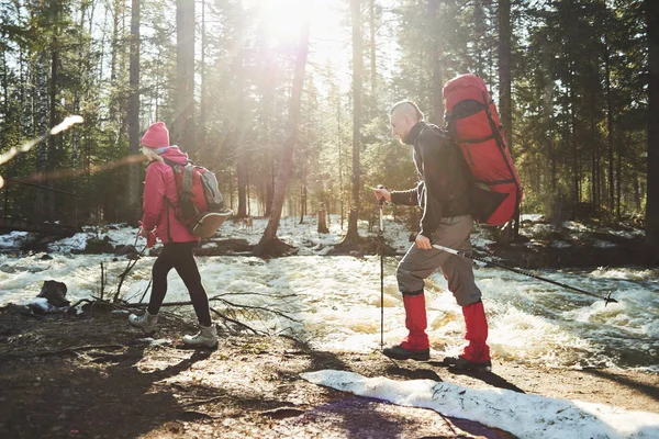 Male Female Hikers Backpacks Walking Riverbank Spring Forest — Stock Photo, Image
