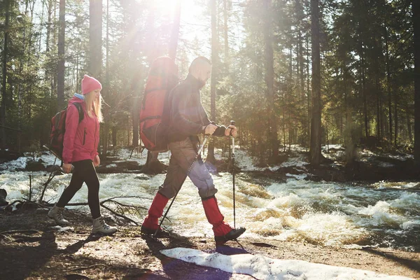 Male Female Hikers Backpacks Walking Riverbank Spring Forest — Stock Photo, Image