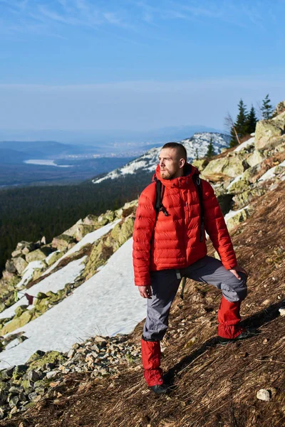 Hiker Backpack Wearing Warm Clothes Standing Snowy Slope Mountains Background — Stock Photo, Image