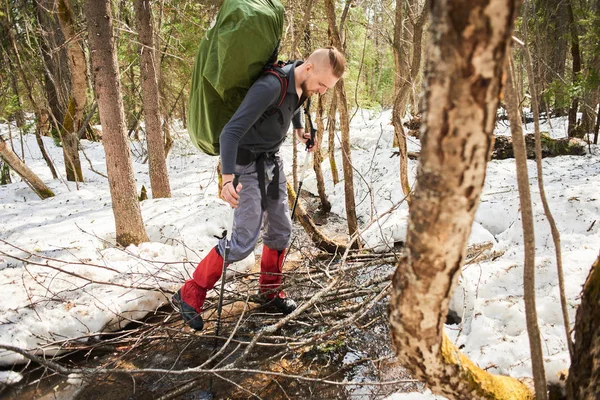 Backpacker Stepping Branches While Crossing Stream Woodland — Stock Photo, Image