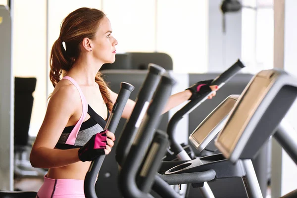 Woman Tail Hairstyle Working Out Elliptical Gym Windows — Stock Photo, Image