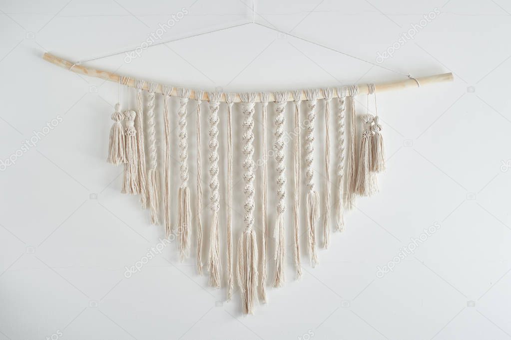 macrame decoration for interior isolated on white background, close-up 