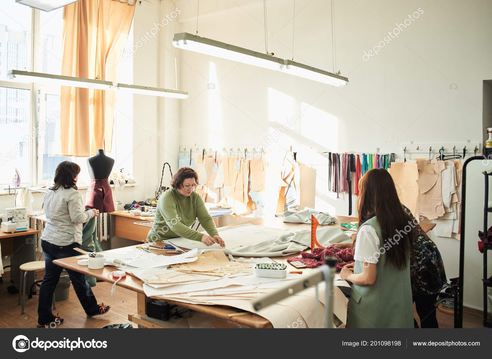 Concentrated Seamstress Putting Textile Table Measuring Tape Creation  Clothes Atelier Stock Photo by ©amixstudio 201120288