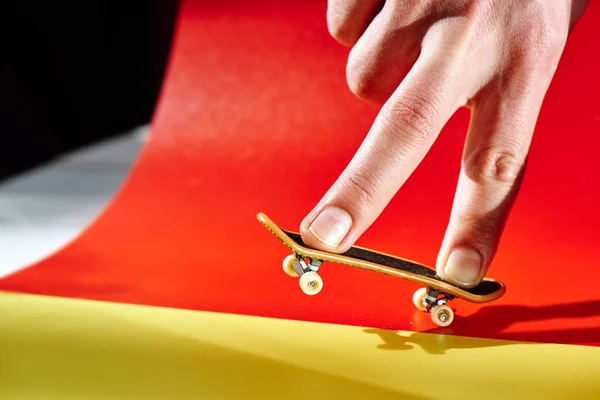 Male Fingers Doing Trick Fingerboard Red Background Close — Stock Photo, Image