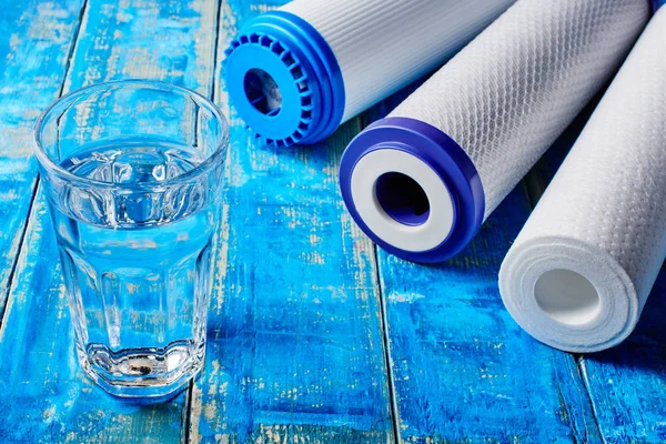 Water Filters Carbon Cartridges Glass Blue Background Household Filtration System — Stock Photo, Image