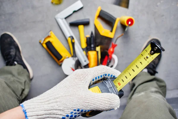 Concept Repair Male Hand Holding Tape Measure Background Construction Tools — Stock Photo, Image