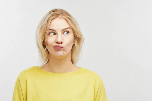Portrait Embarrassed Young Woman Confused Mouth Yellow Clothes White Background — Stock Photo, Image