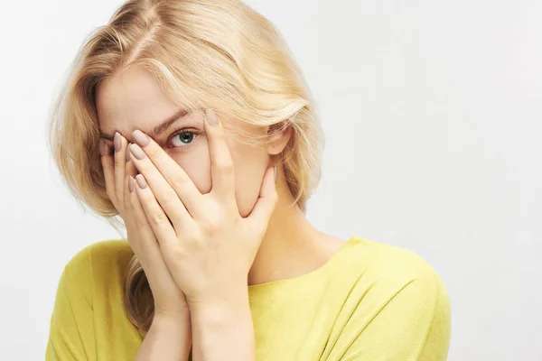 Blond Woman Hides Her Face Palms Peeps One Eye White — Stock Photo, Image