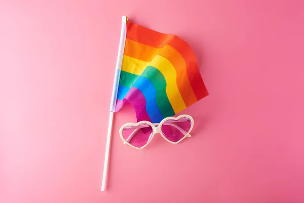 Pink glasses, hearts and rainbow flag lgbt. Gay parade