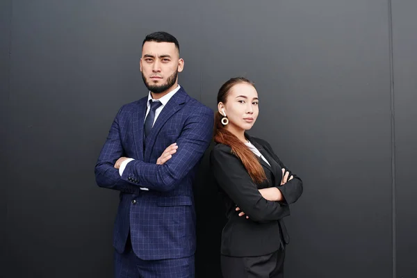 Businessman Businesswoman Realtors Black Office Wall Background Asian Kazakh Entrepreneurs — ストック写真