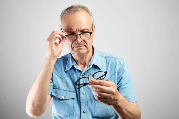 Old Man Eye Glasses Diopters Squints Stares Intently Camera Isolated — Stock Photo, Image