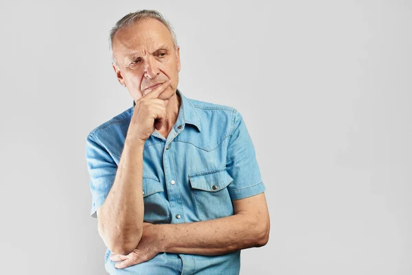 Pensive Pensioner Looks Skeptically Side Holds His Chin Thinks White — Stock Photo, Image