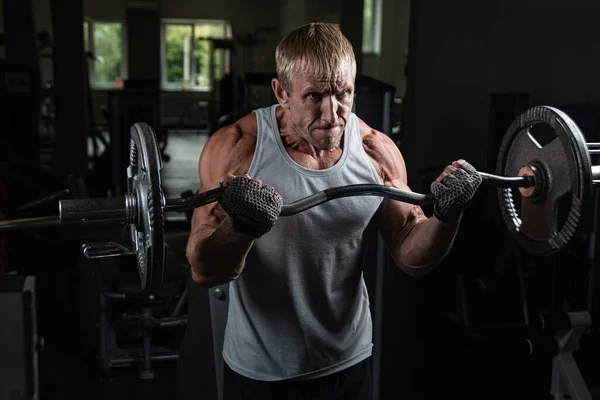 Musclé Homme Brutal Adulte Avec Haltère Pompe Ses Bras Dans — Photo