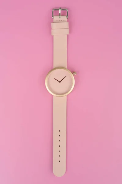 close up of pink wrist watches for background