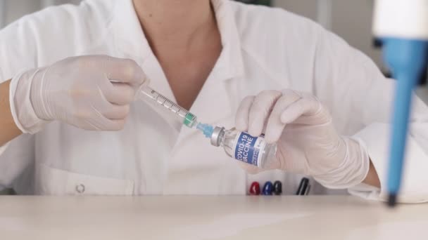 Corona Virus Vaccine Put in Syringe — Stock Video