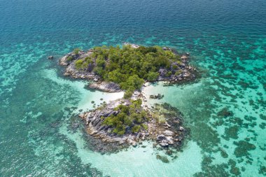 Aerial view of tropical white sand beach and crystal blue sea near the Lipe Island. 