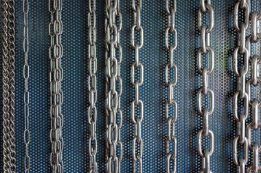 Metal chains for industrial strong link concept background.