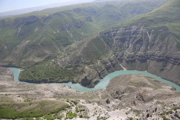 The mountain landscape, Canyon, the mountain river flows between high rocks. blue water. Nature of the North Caucasus