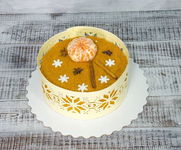 Chocolate anniversary cake with cinnamon and tangerine — Stock Photo, Image