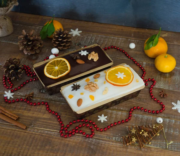 Chocolate orange Christmas  cake with fir tree and other decoration