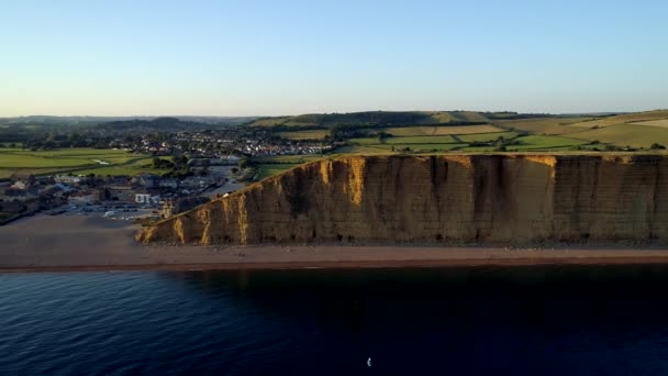 Drone Tracks Sideways Cliff Beach West Bay Dorset Countryside Shot — Stock Video