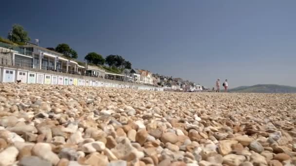 Low Level Slide Shot Pebbles Sandy Beach Lyme Regis Marine — Stock Video