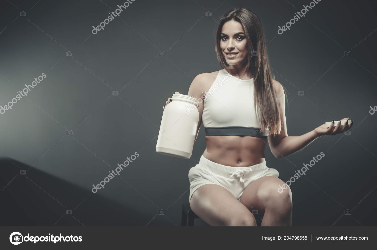 Beautiful Strong Sexy Athletic Young Caucasian Fitness Girl Long Hair Stock Photo C Antondotsenko