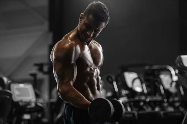 Handsome strong athletic men pumping up muscles workout fitness — Stock Photo, Image