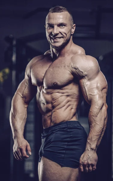 Brutal strong athletic men muscles workout bodybuilding muscular — Stock Photo, Image