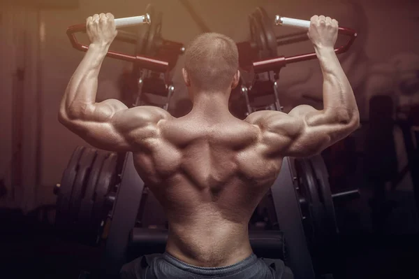 Bodybuilder Handsome Strong Athletic Rough Man Pumping Back Muscles Workout — 图库照片