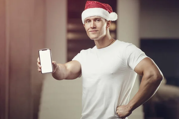 Hombre Fitness Con Traje Sombrero Santa Claus Gimnasio Con Teléfono — Foto de Stock