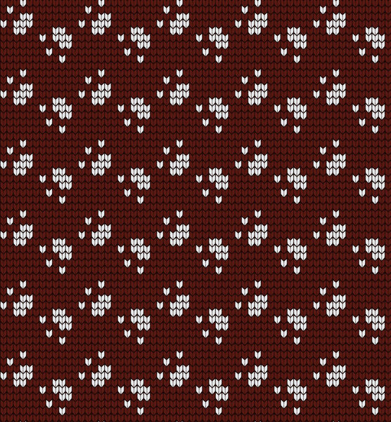 Seamless knitted pattern with cat paws
