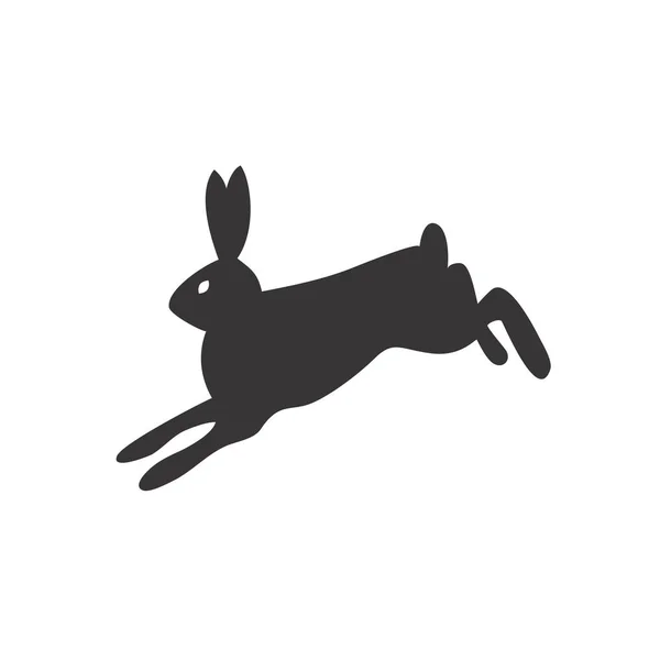 Silhouette noire et blanche d'un lapin ou lièvre moelleux assis sur un fond blanc. Convient comme logo, icône ou élément de design de vos projets de design . — Image vectorielle