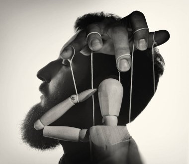 Marionette in male head, black and white. Concept of mind control. Image clipart