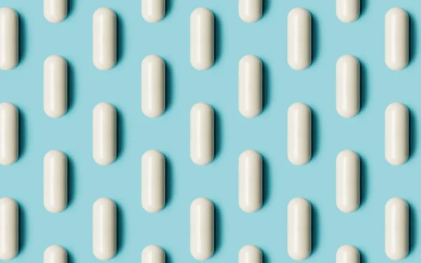 Wzór Białymi Tabletkami Niebieskim Tle Kontekst Przemysłu Farmaceutycznego Kreatywny Wizerunek — Zdjęcie stockowe