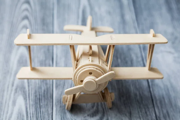 front view of wooden toy airplane