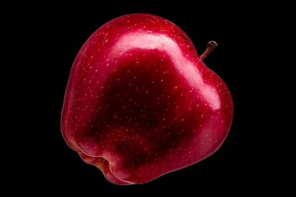 Pomme rouge unique délicieuse sur fond noir — Photo