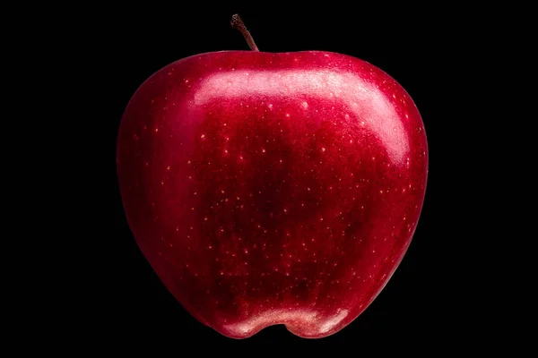 Pomme rouge unique délicieuse sur fond noir — Photo