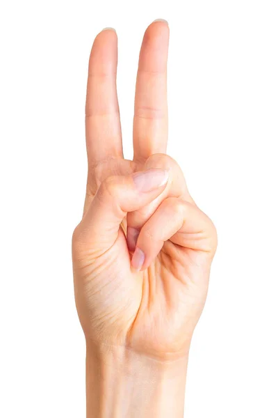 Female hand showing two fingers in the peace symbol Stock Photo