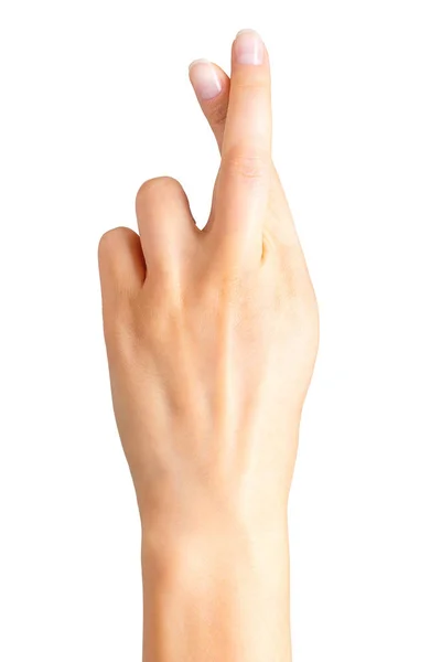 Mano de mujer con dedos cruzados, gesto de símbolo de buena suerte — Foto de Stock