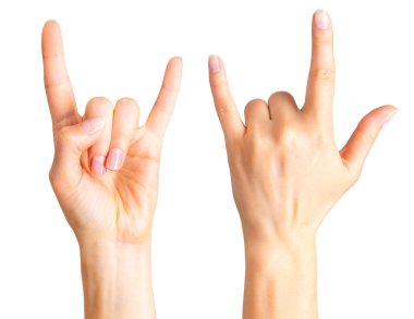 Rock n roll işaret gösteren ya da şeytan boynuzu jest kadın kümesi eller