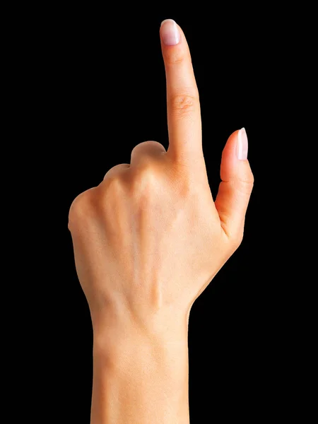 Frauenhand mit erhobenem Zeigefinger — Stockfoto